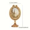 62ccb9c7-e741-4d7d-9c7b-52468a57dfd8.jpg A Beautifully Crafted Vintage-Style Oval Golden Photo Frame Ornament