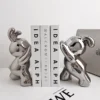 sg-11134201-23030-tjkx2c6v3dovb6.webp Simple Cute Funny Ceramic Rabbit Bookend Decoration Tv Cabinet Living Room Light Luxury Home Accessories Desktop Bookends Decorations Gifts